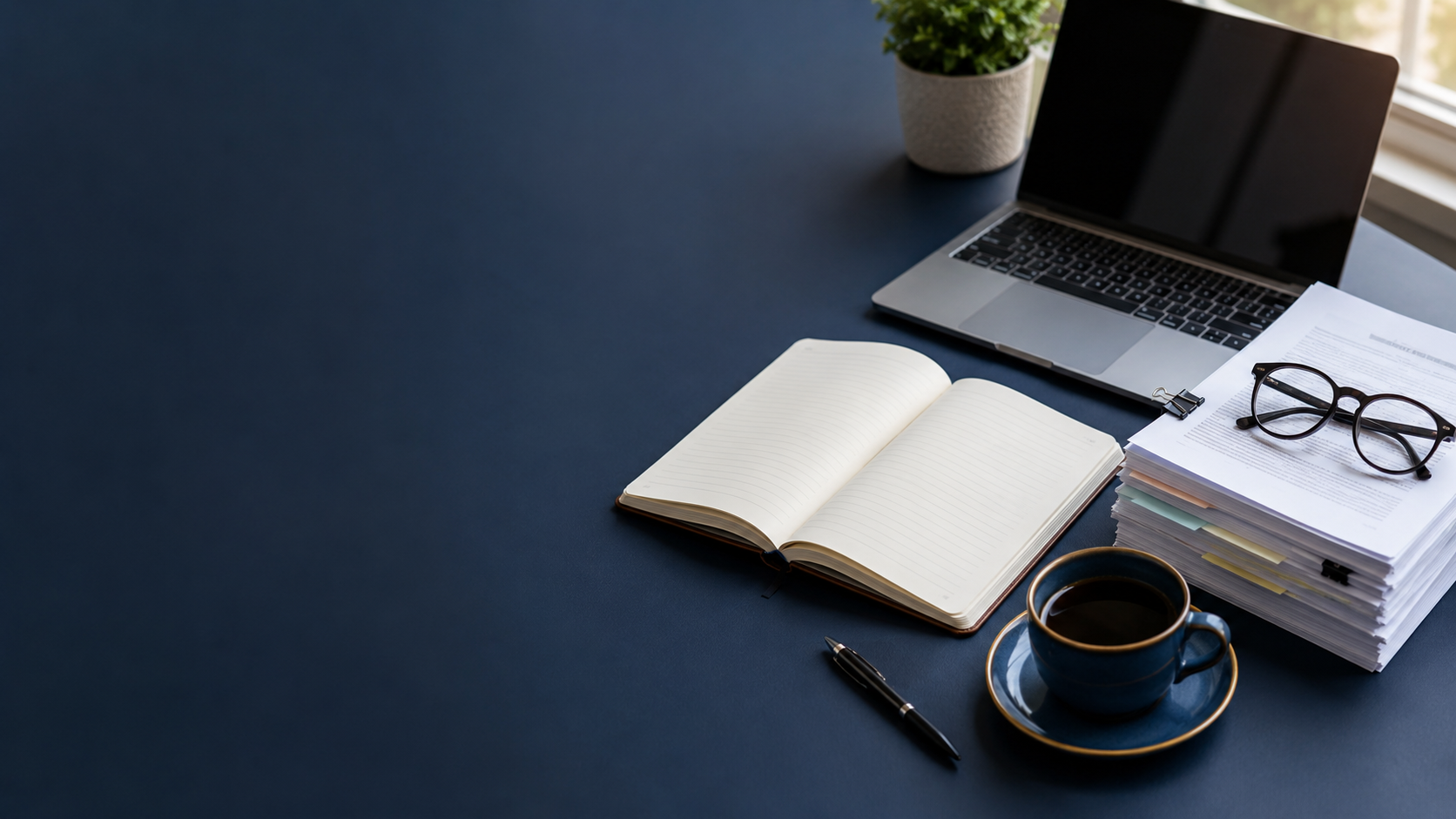 Thesis writing services in Kenya for Masters and PhD students — research desk with laptop and papers